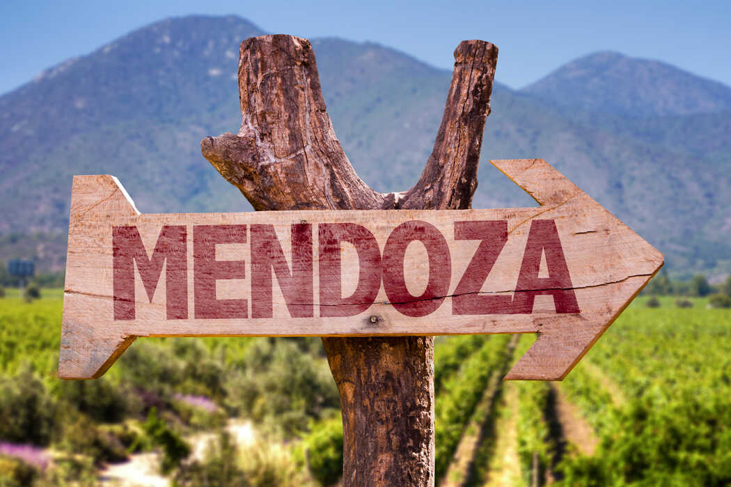 A wooden sign with the word mendoza written on it.